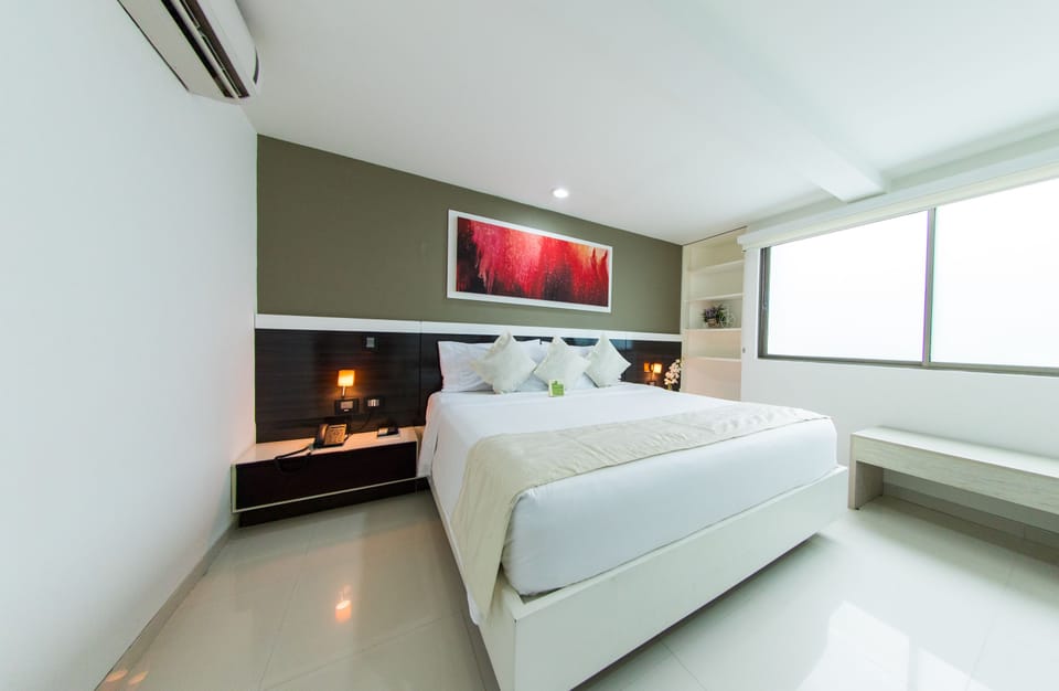 Frette Italian sheets, premium bedding, down comforters, minibar