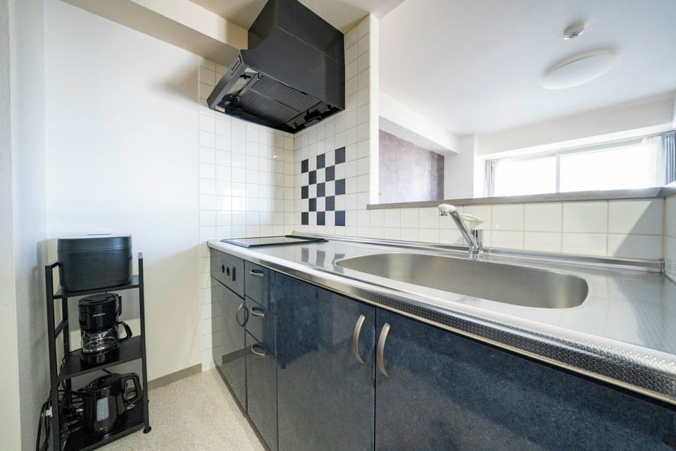Full-size fridge, microwave, stovetop, electric kettle