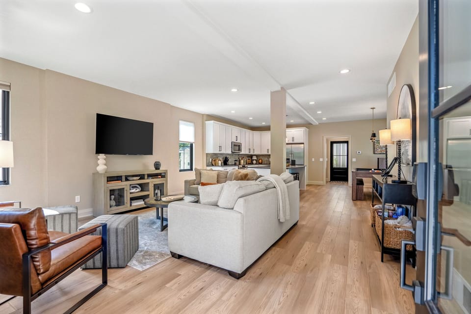 Comfortable living room area with a cozy couch and chairs—perfect for relaxing.