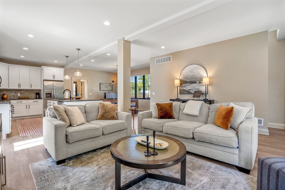Comfortable living room area with a cozy couch and chairs—perfect for relaxing.