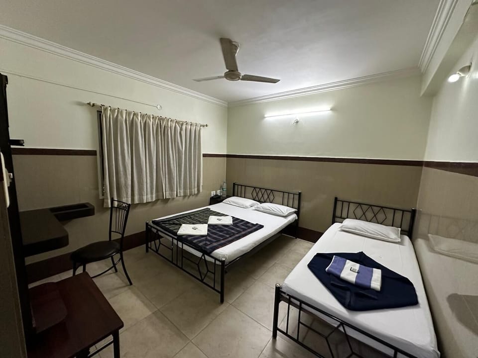 Basic Triple Room | Egyptian cotton sheets, premium bedding, memory foam beds, desk