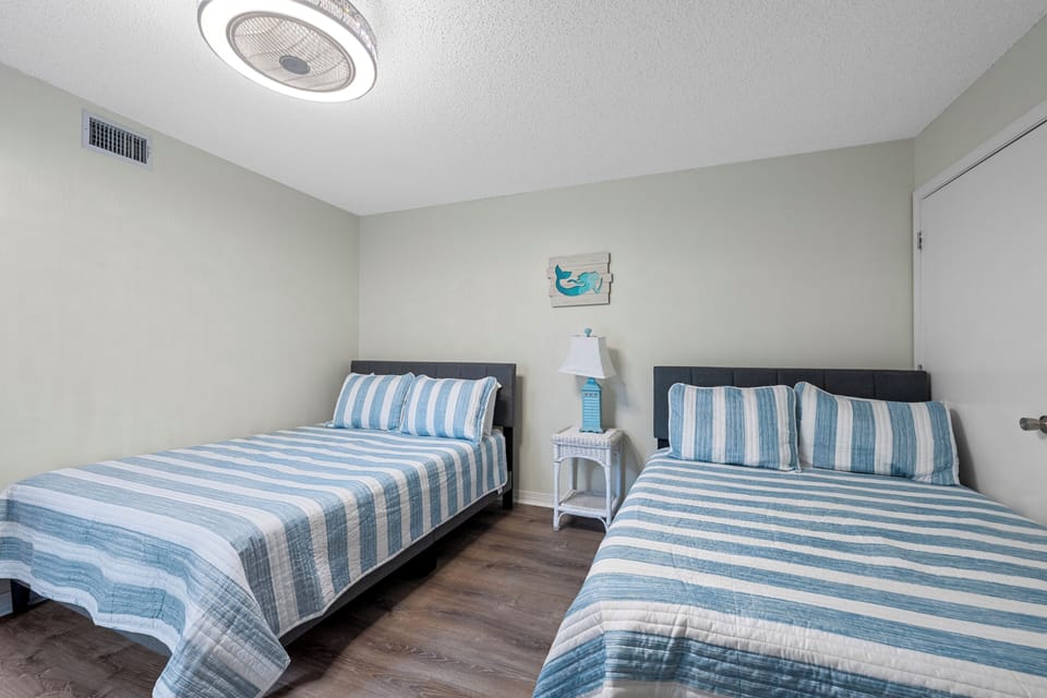 Signature Condo, 2 Bedrooms, Non Smoking, Kitchen | 2 bedrooms, iron/ironing board, WiFi (free), individually decorated