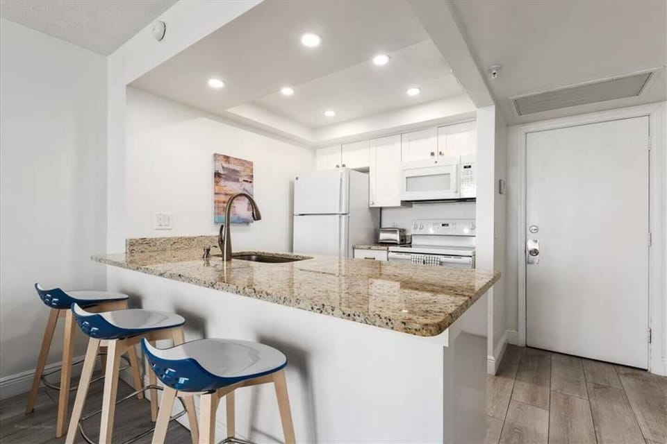 Fully Stocked Kitchen. Blender, Toaster, Waffle iron, Mixer, Coffee maker with drip and k-cup, pots, pans, utensils, dishwasher, cupcake pan, mixing bowls, plates, bowls, mugs, and cups. Children's utensils, plates, cups, and bowls. And more