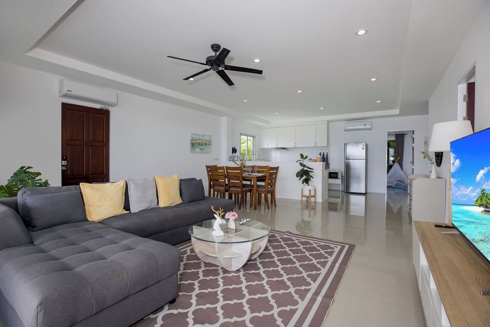 Design Apartment, 3 Bedrooms, Ocean View | Living area | Flat-screen TV