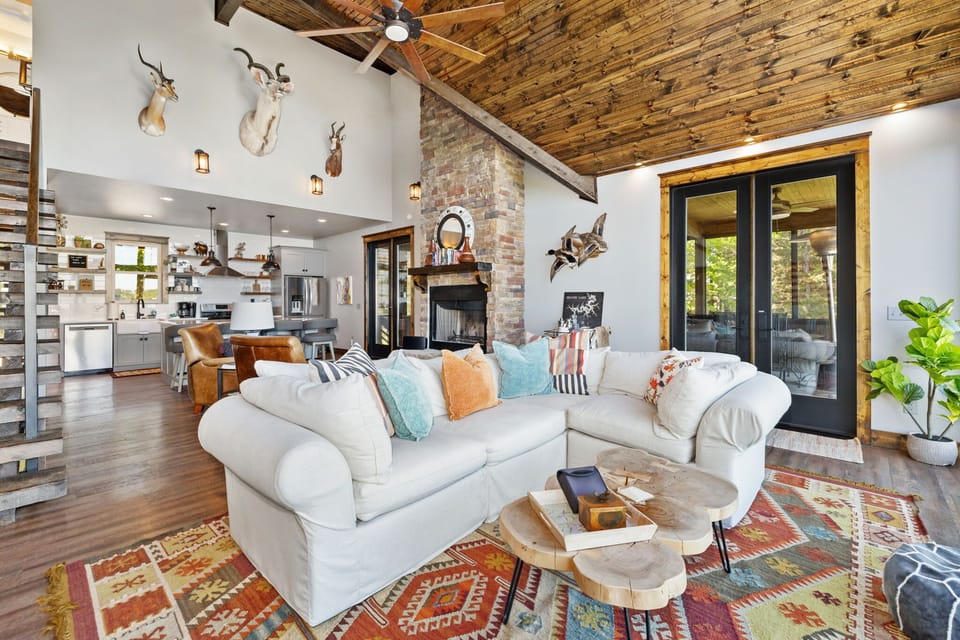 When you first enter our home, you'll be greeted by our open concept living space and kitchen area.