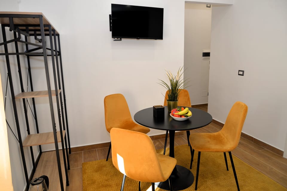Deluxe Quadruple Room, City View | Desk, laptop workspace, soundproofing, free WiFi