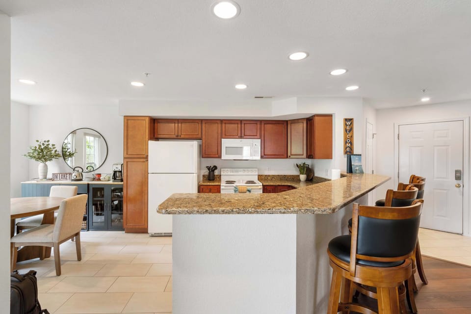 The open kitchen offers ample space & all the comforts of home