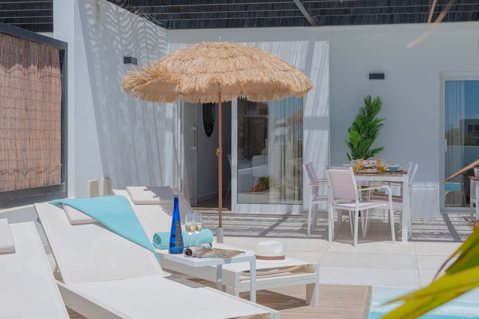 Outdoor sun terrace ideal for relaxing by the pool.