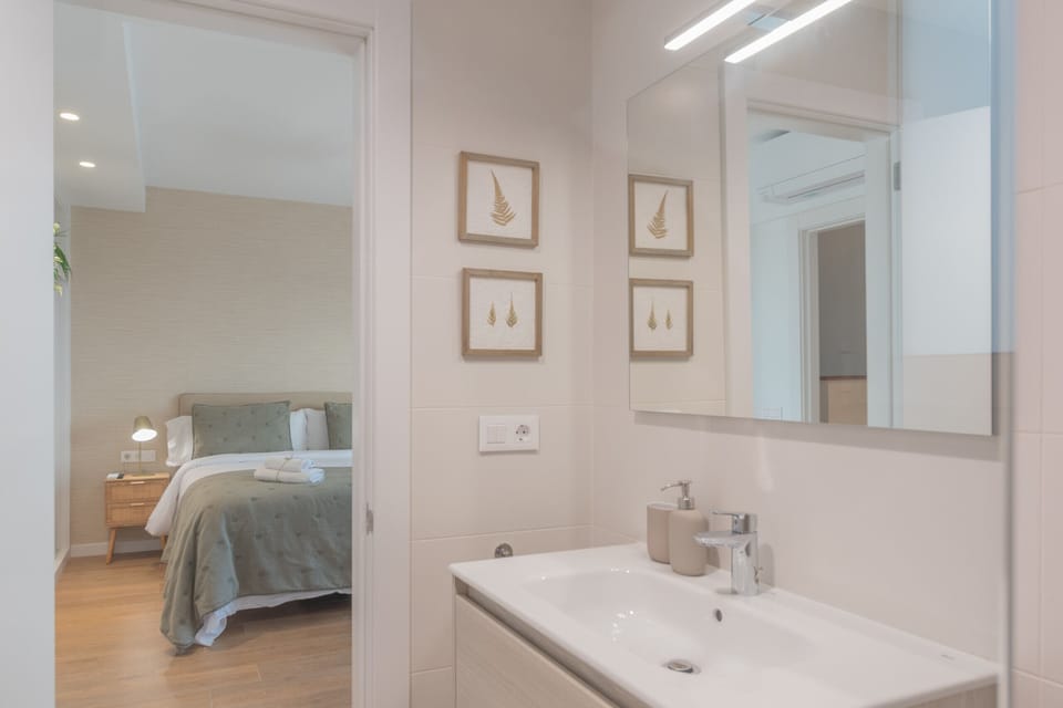 Master bedroom with private bathroom and shower.