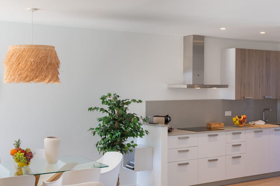 Elegant indoor dining area open to the kitchen.