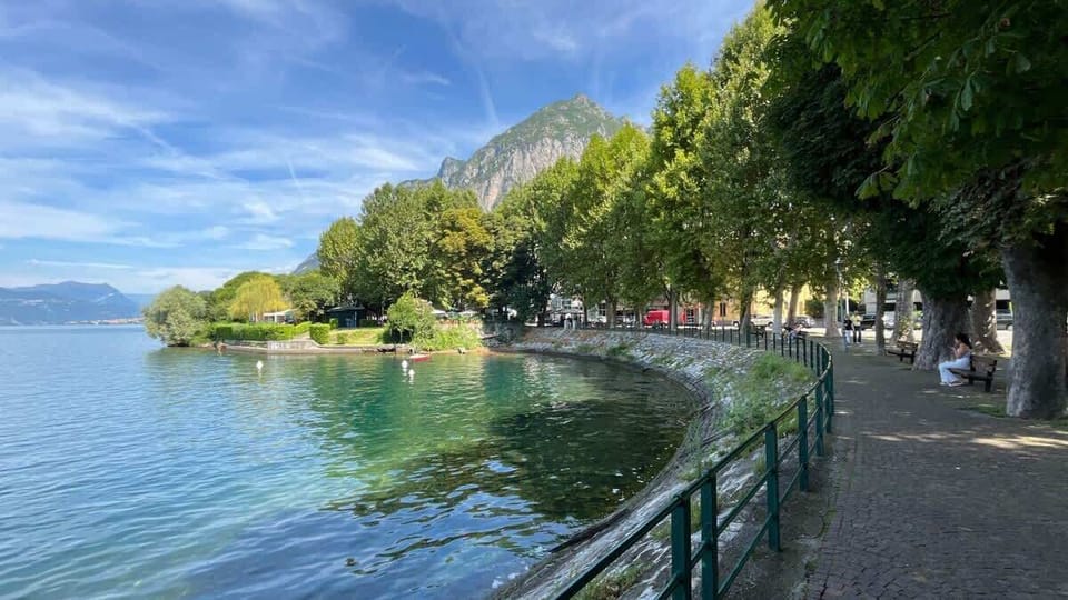 Crystal clear lake surrounded by green mountains