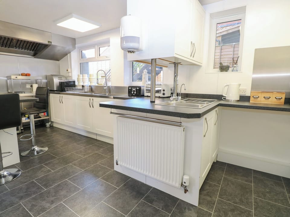 Fridge, microwave, toaster, cookware/dishes/utensils