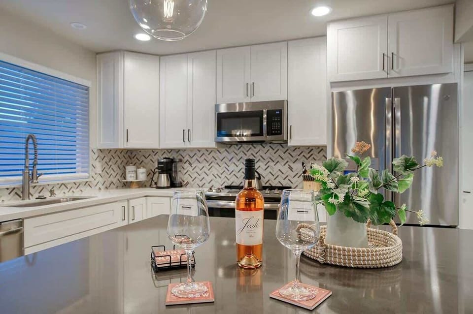 Double door fridge and large freestanding island.
