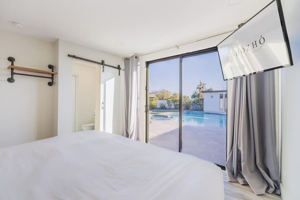 Bedroom Six | The River Retreat | Detached Studio with Scenic Views of Resort Style Lazy River