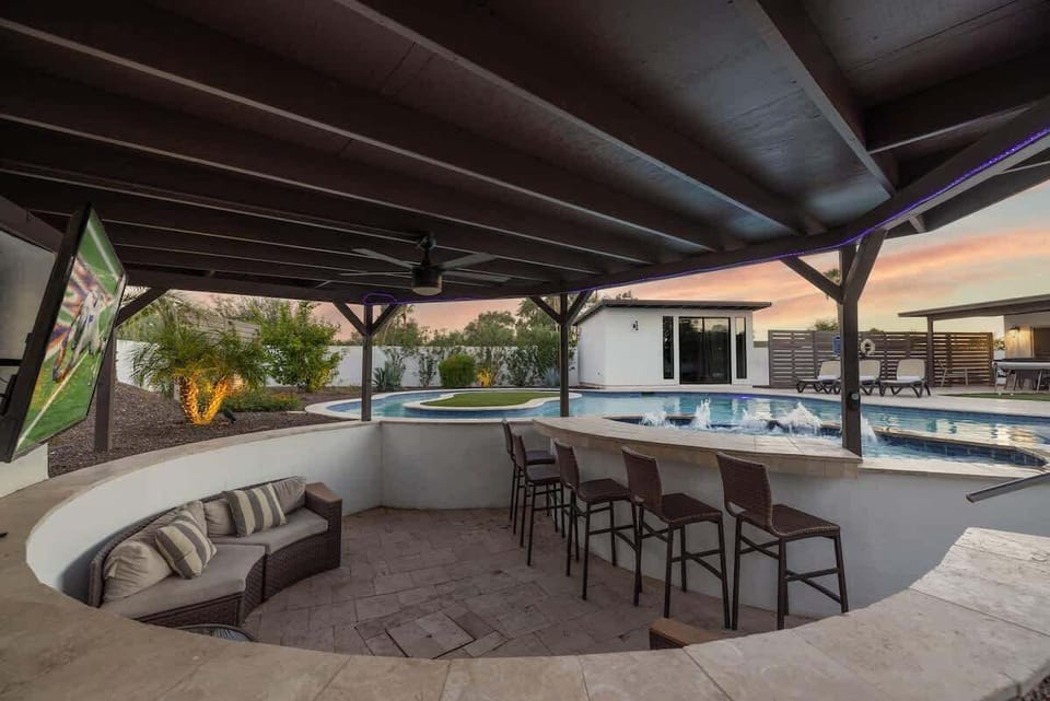Experience resort living: drinks, entertainment, and sun-kissed swims.