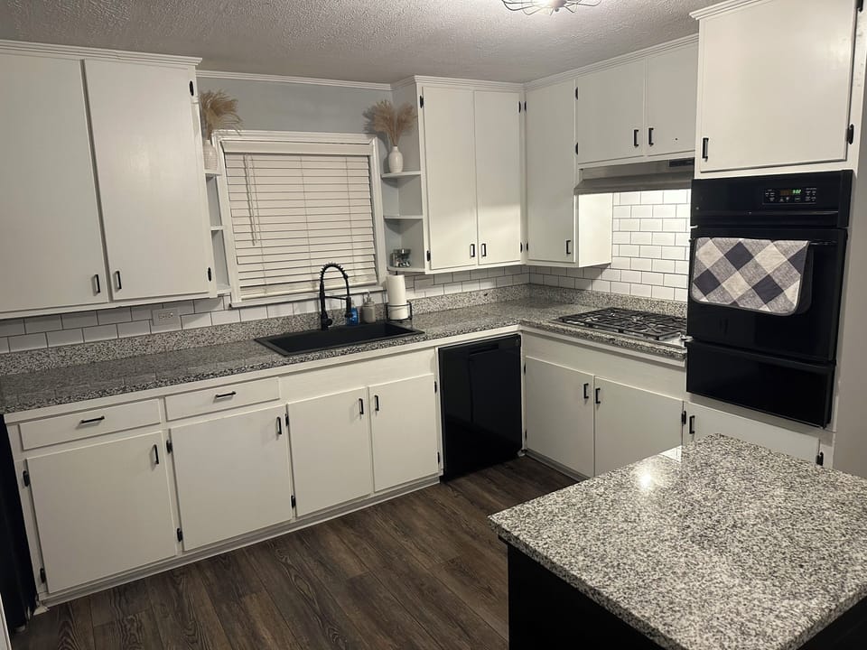 Large sink, gas cook top and oven 