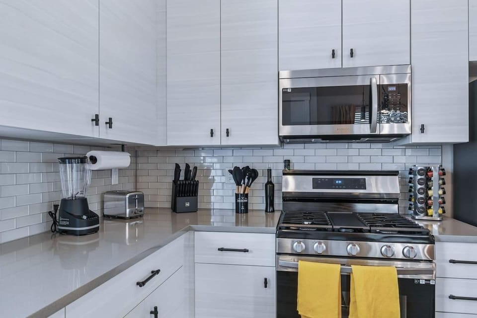 Cook like a pro with premium appliances, a stocked knife set, and handy gadgets right at your fingertips.