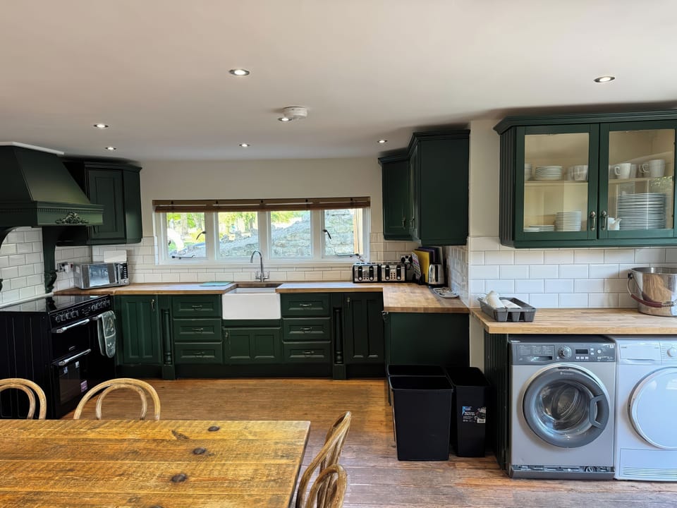 Fridge, microwave, toaster, cookware/dishes/utensils