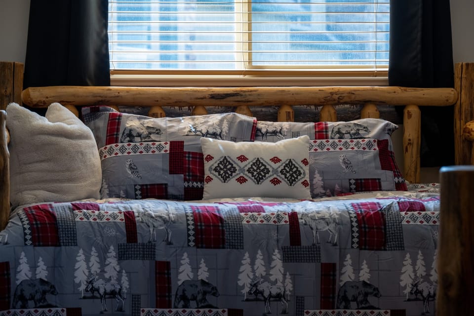 Comfortable linens and pillows await.