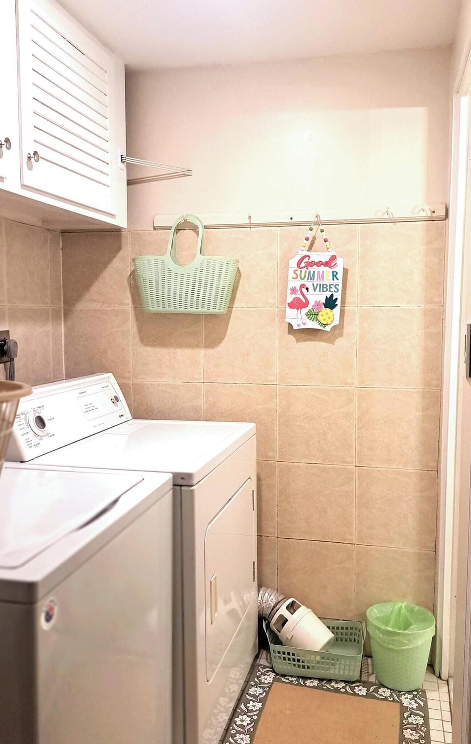 Washer / Dryer, laundry basket, and hooks to dry wet items