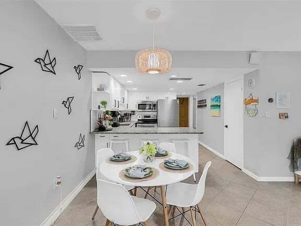 Chic and cozy setup for shared meals just steps from the kitchen.