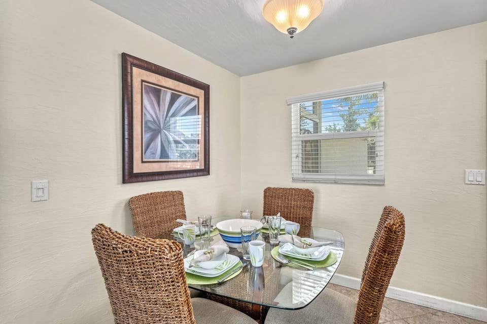 Crisp and clean dining space steps from the kitchen and living area.