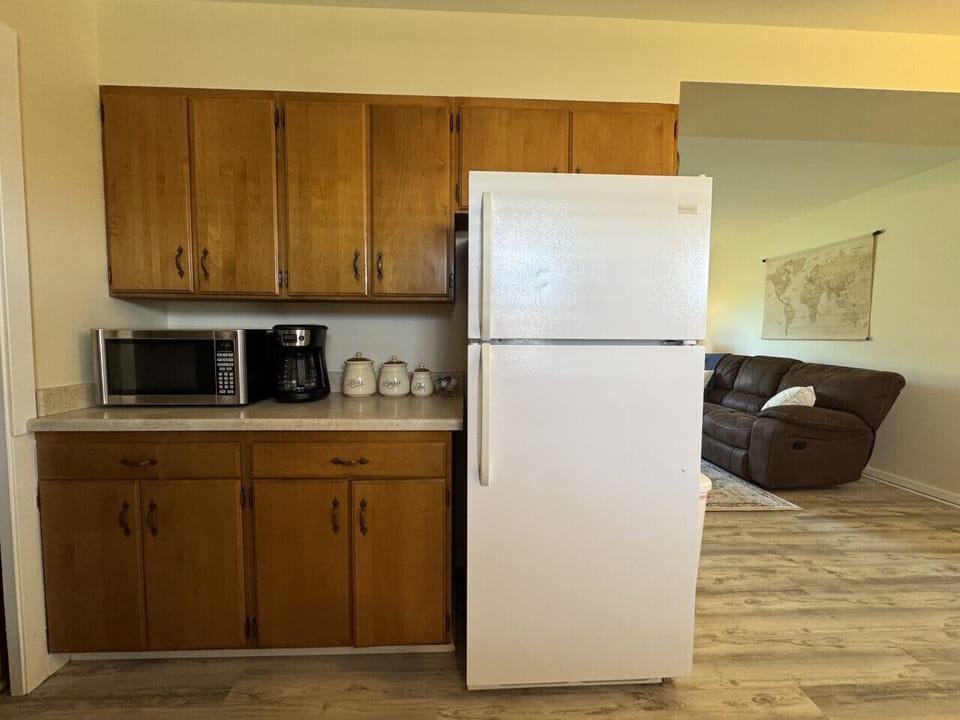 Fully stocked kitchen adjacent to the dining area