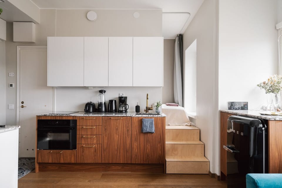 Apartment kitchen is modern and well equipped