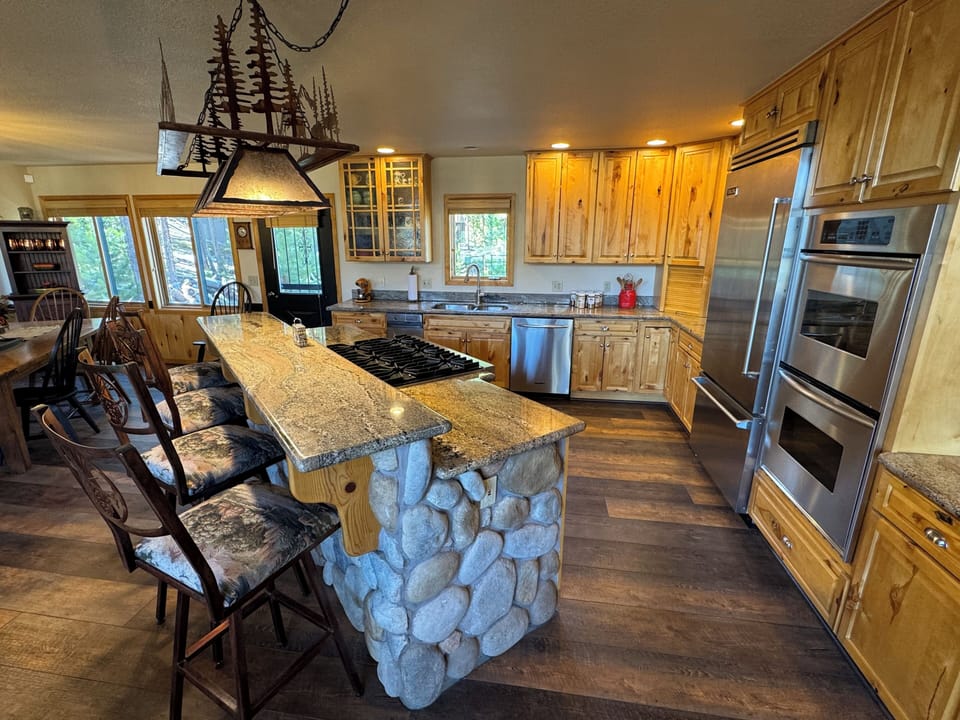 Stocked with tons of cookware and spices, you'll feel right at home! 