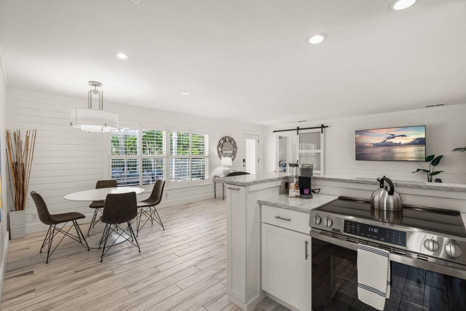 Gather, laugh, and enjoy a meal together in this inviting dining space.