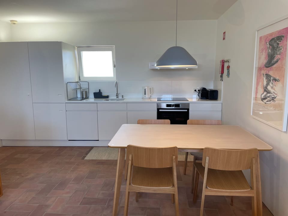 Espaço de refeições e cozinha