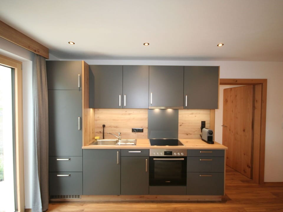 Furniture, Kitchen, Cabinetry, Countertop, Kitchen Appliance, Flooring, Wood, Interior Design, Major Appliance, Cupboard