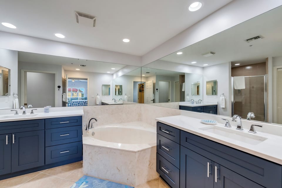 Luxurious Primary Bath has double vanities