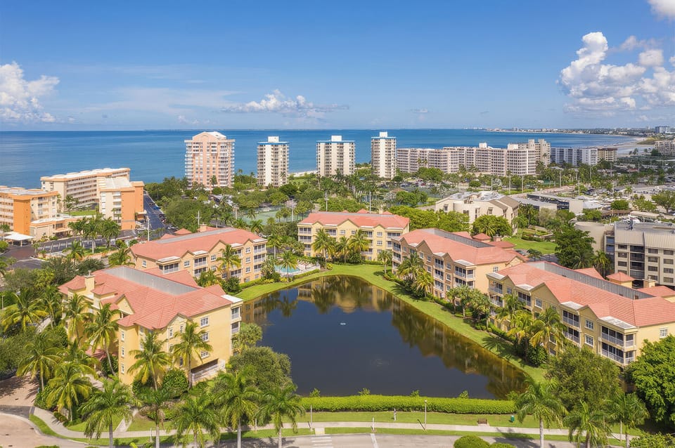 Luxury condominiums at Bella Lago is in the upscale community of Bay Beach Lane and located just across the street from the beach.