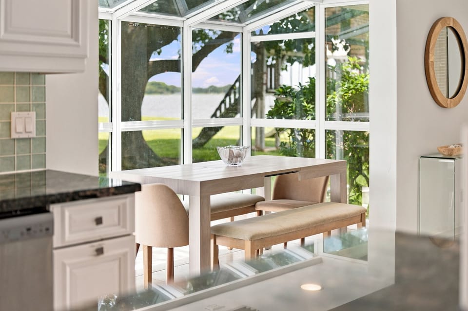 Charming breakfast nook with garden and lake views just off the kitchen.