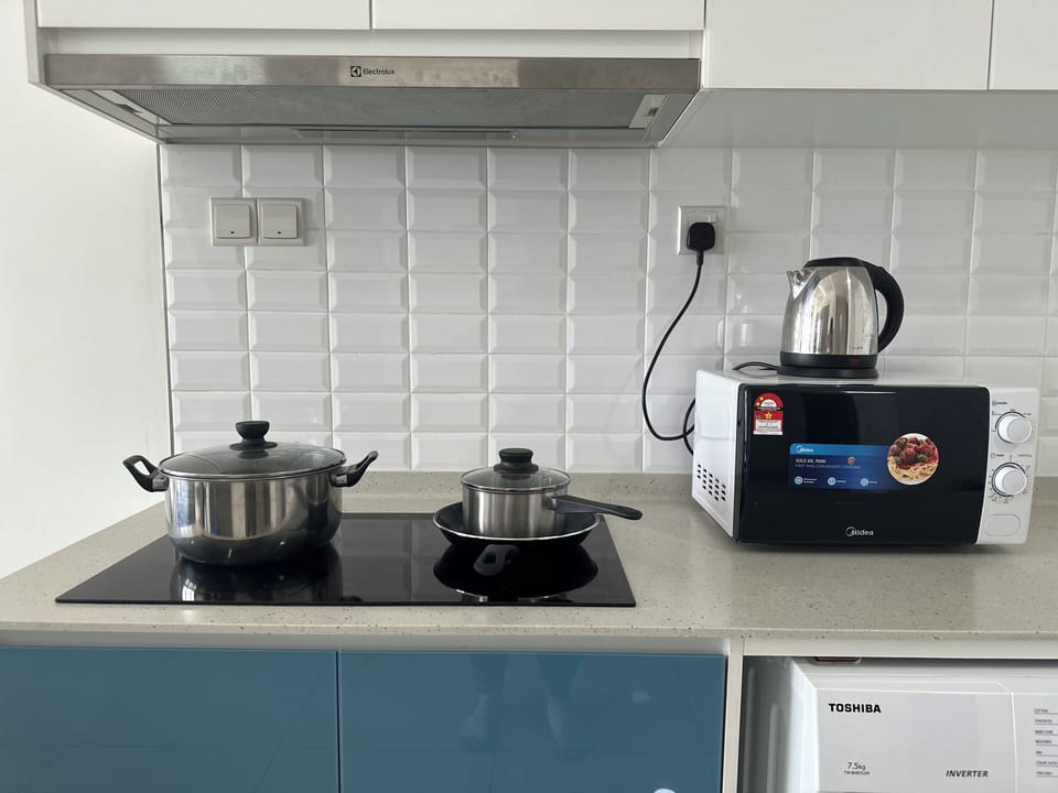 Deluxe Studio, Non Smoking, City View | In-room safe, blackout drapes, iron/ironing board, free WiFi