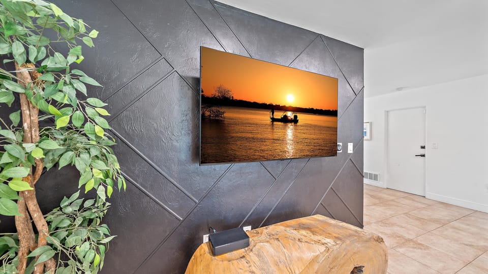 Kick back and enjoy movie night on the large, modern Smart TV, perfect for streaming your favorite shows after a sunny day at the private pool or Sarasota beaches.