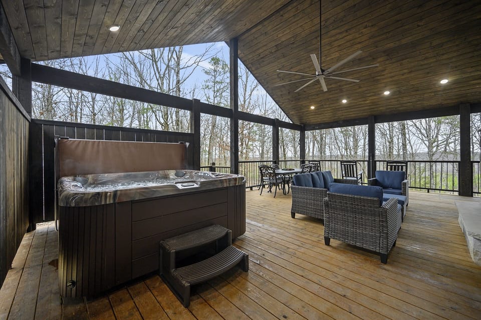 Spa Retreat: Unwind in the hot tub on a spacious deck overlooking serene woods!