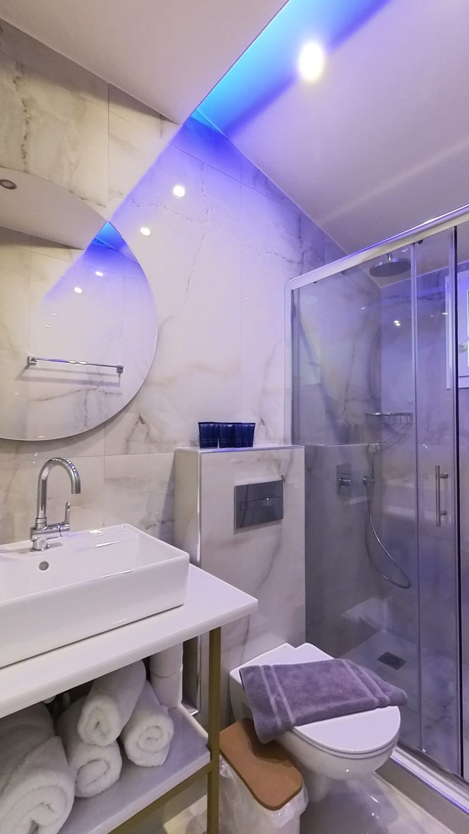 Shower, slippers, towels, soap