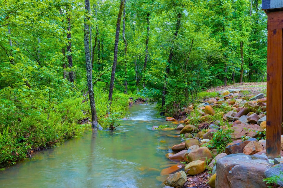 Peaceful seasonal creek adds to the charm of this secluded cul-de-sac property.