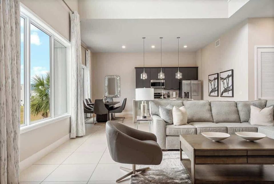 Stay in this elegant, open-concept condo featuring a cozy living area, stylish dining space, and a modern kitchen with sleek finishes. Large windows bring in natural light and offer tranquil views. Perfect for relaxing. Book your escape today!