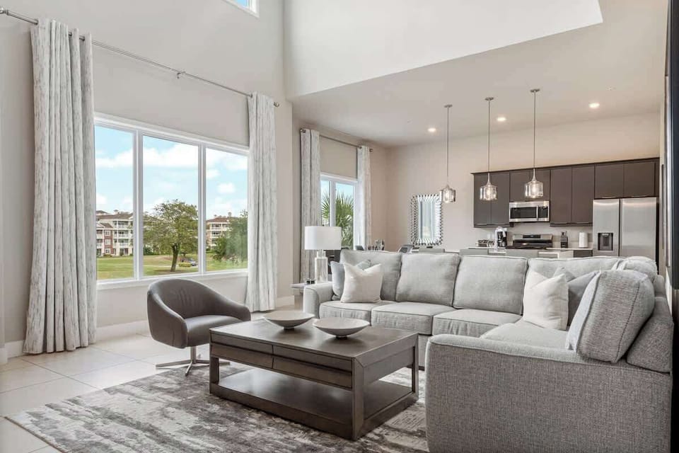 Experience luxury in this bright, modern 2-story condo! Featuring a spacious living area, gourmet kitchen, and stunning golf course views, this stylish retreat is perfect for relaxing. Close to top attractions, dining, and shopping. Book now!