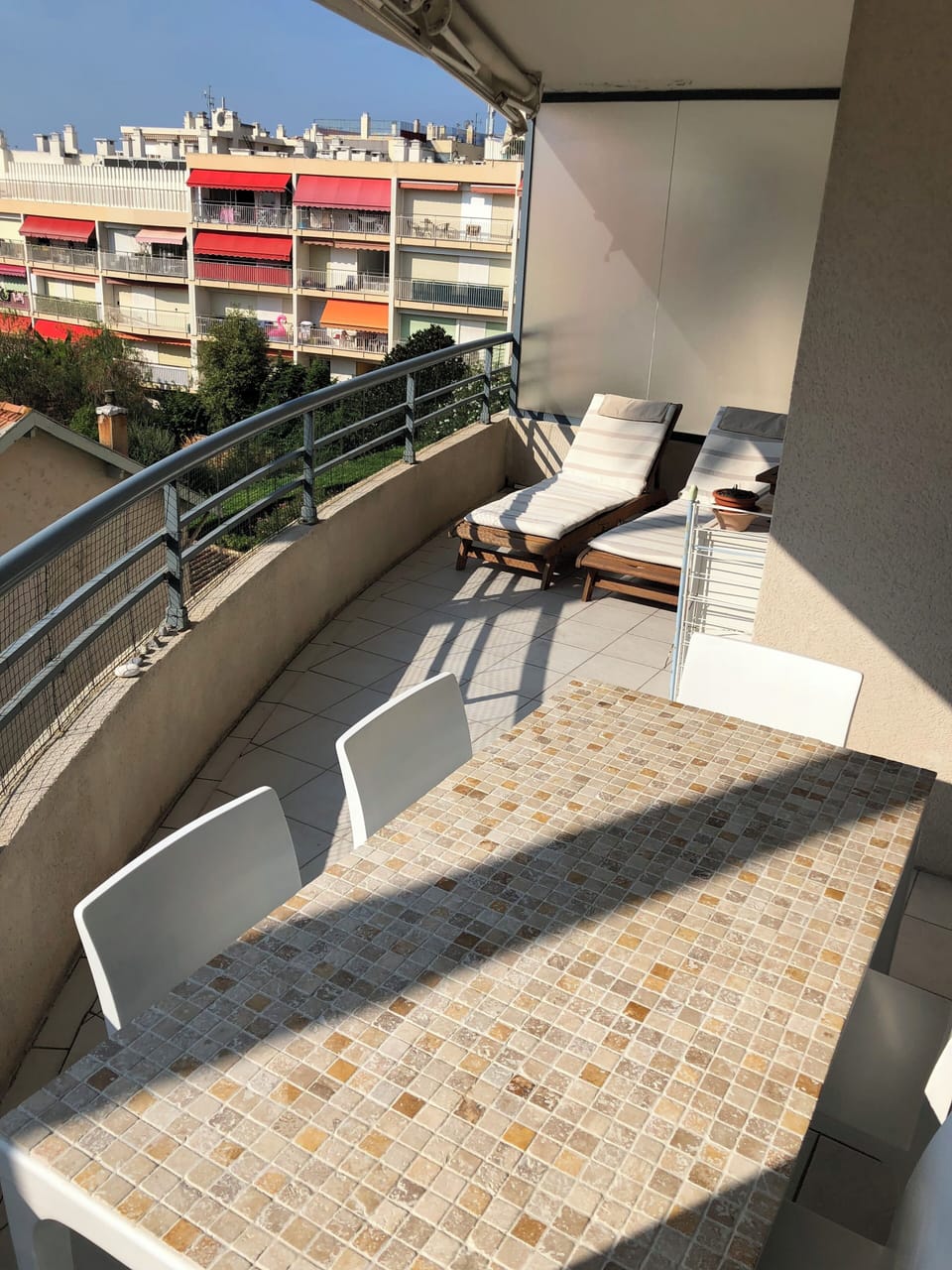Sun terrace with large teak sun loungers x 2