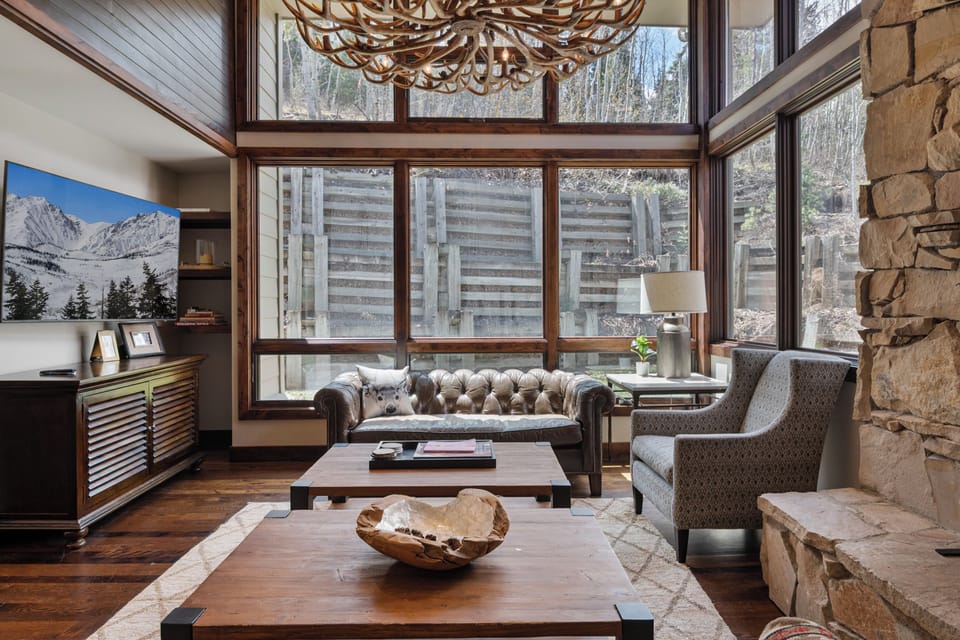 Deluxe Townhome | Living area | 40-inch flat-screen TV with cable channels