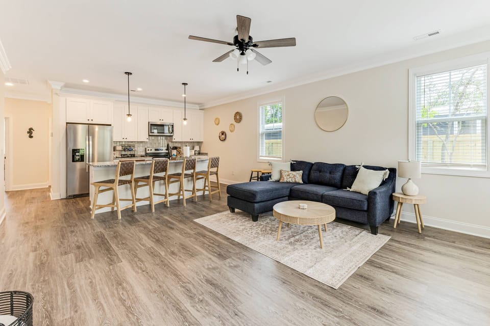 With the open concept house, you can easily converse from the kitchen to the living room or turn on your favorite show while you make a meal