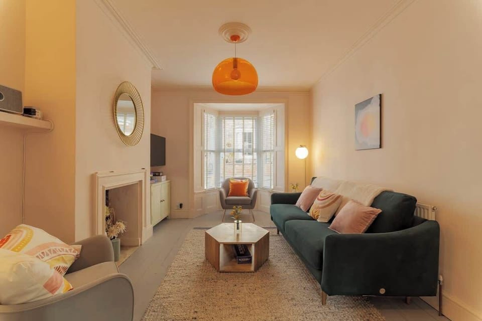 Living room, at the front of the house with smart  TV, games, Bluetooth speaker, heating thermostat. 