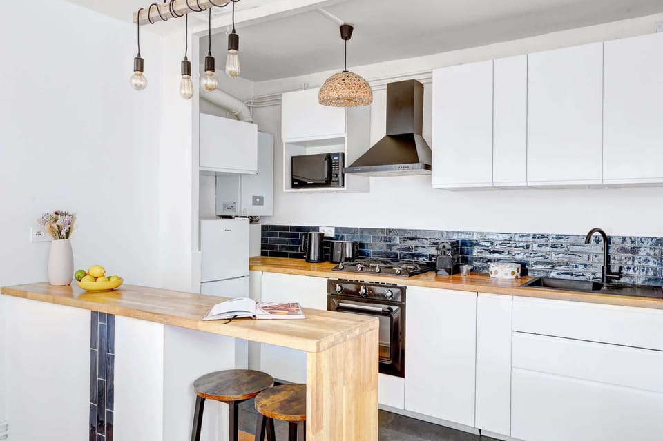 The kitchen is fully equipped to prepare a simple meal 
