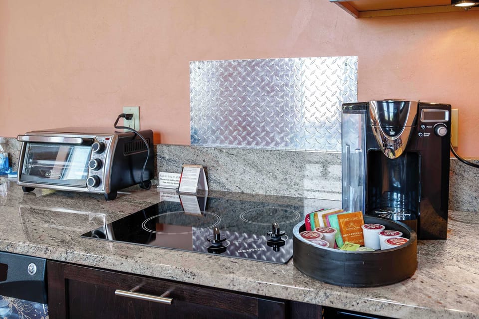 Your kitchen essentials are covered with a stovetop, toaster oven, and a coffee station - plus a curated selection of K-cups and teas for every taste.