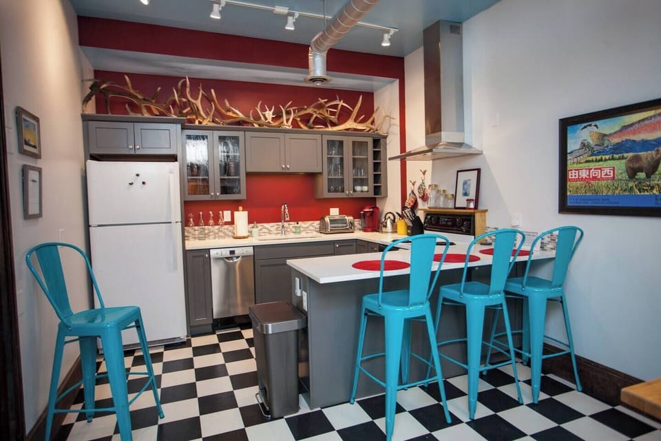 Oversized kitchen invites you to relax & pour a glass of wine.