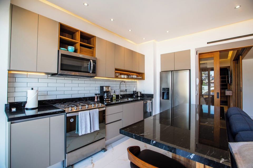 Sleek kitchen—fully-equipped with modern appliances